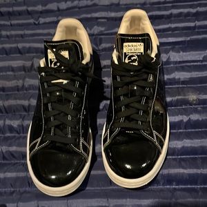 Black leather type adidas sneakers